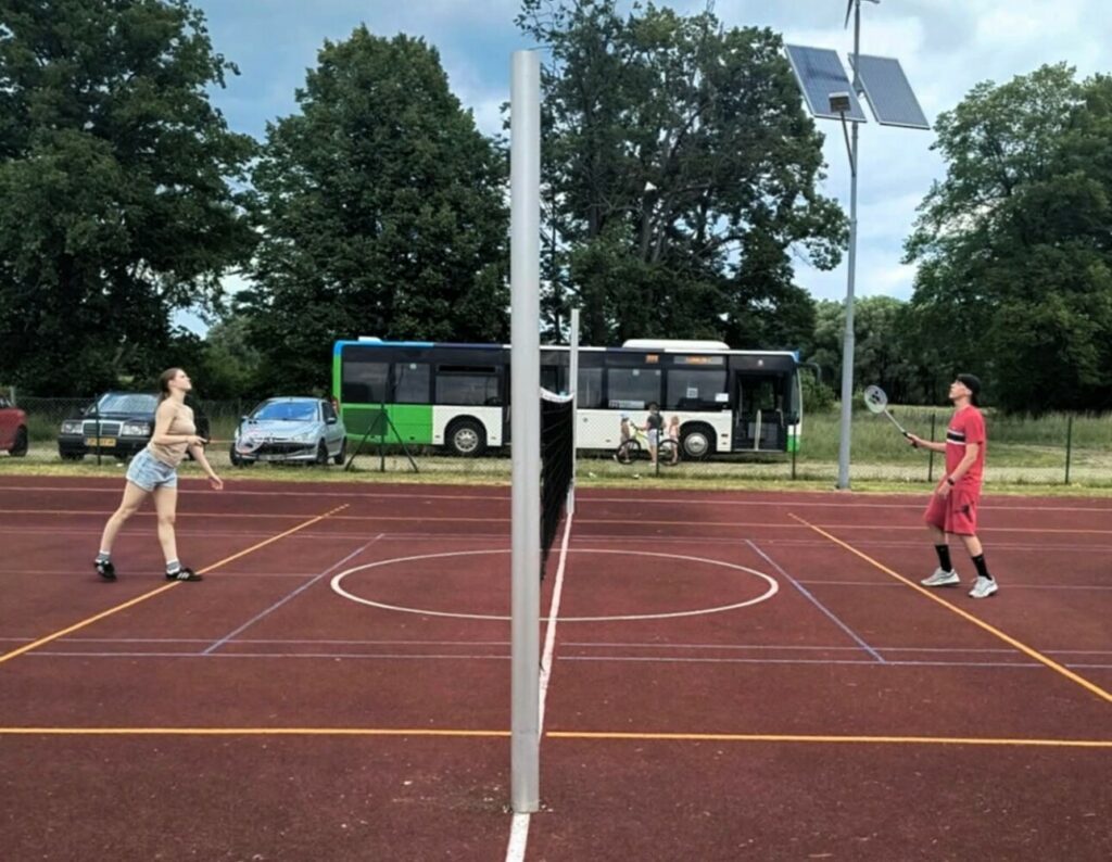 Fotografia przedstawia medal z Turnieju Badmintona.